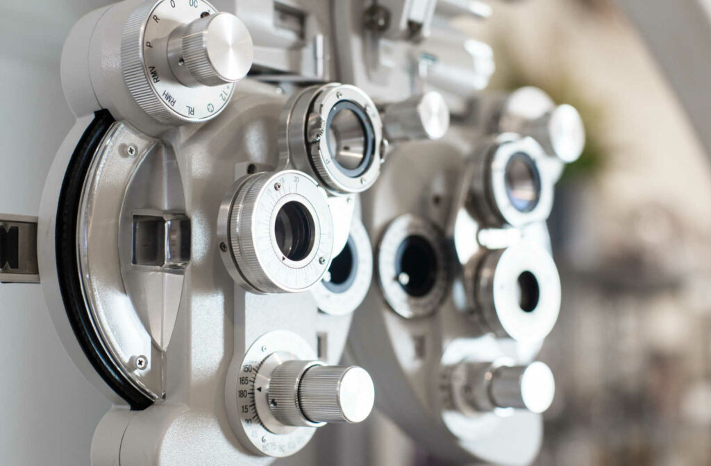 A close up of phoropter in an eye exam room