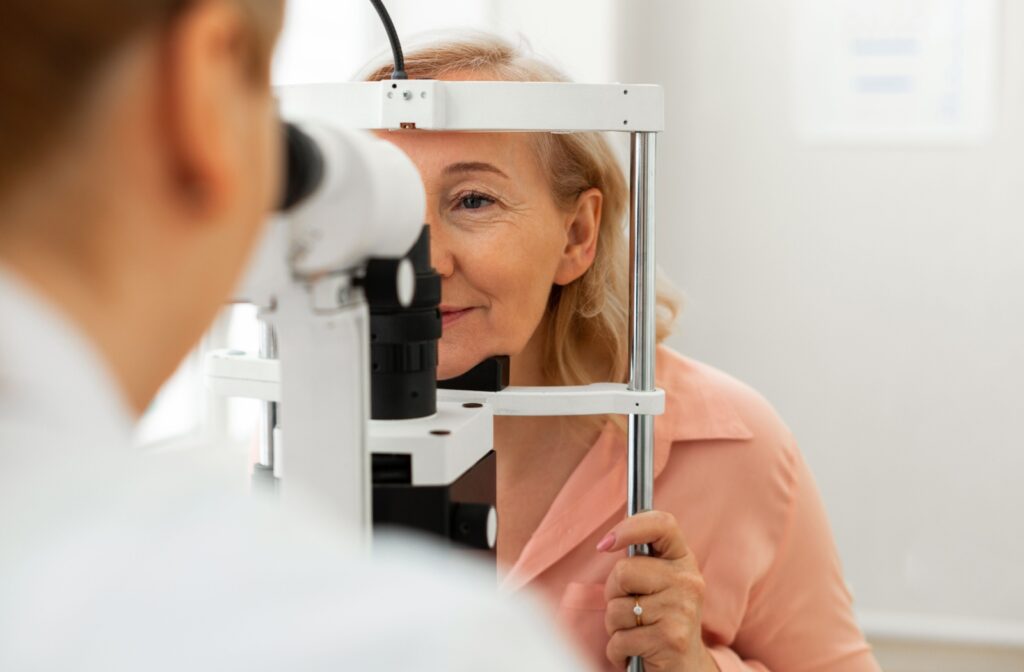 A senior person getting an eye test done during an eye exam